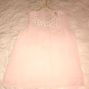 Light pink shirt with sequins.